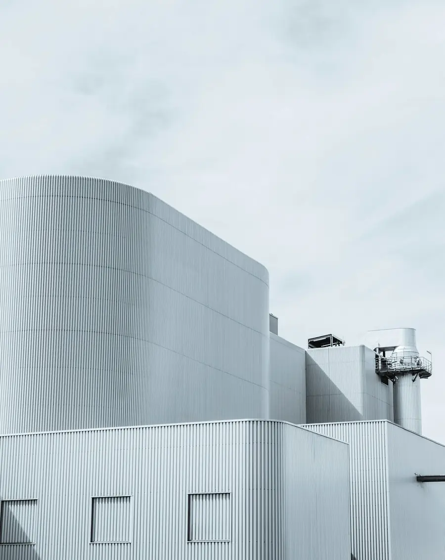 Clad modular industrial building with curved walls